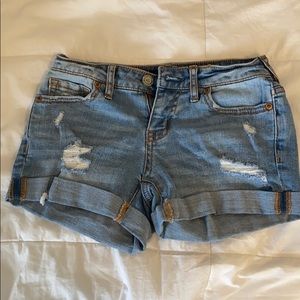 ripped light washed jean shorts